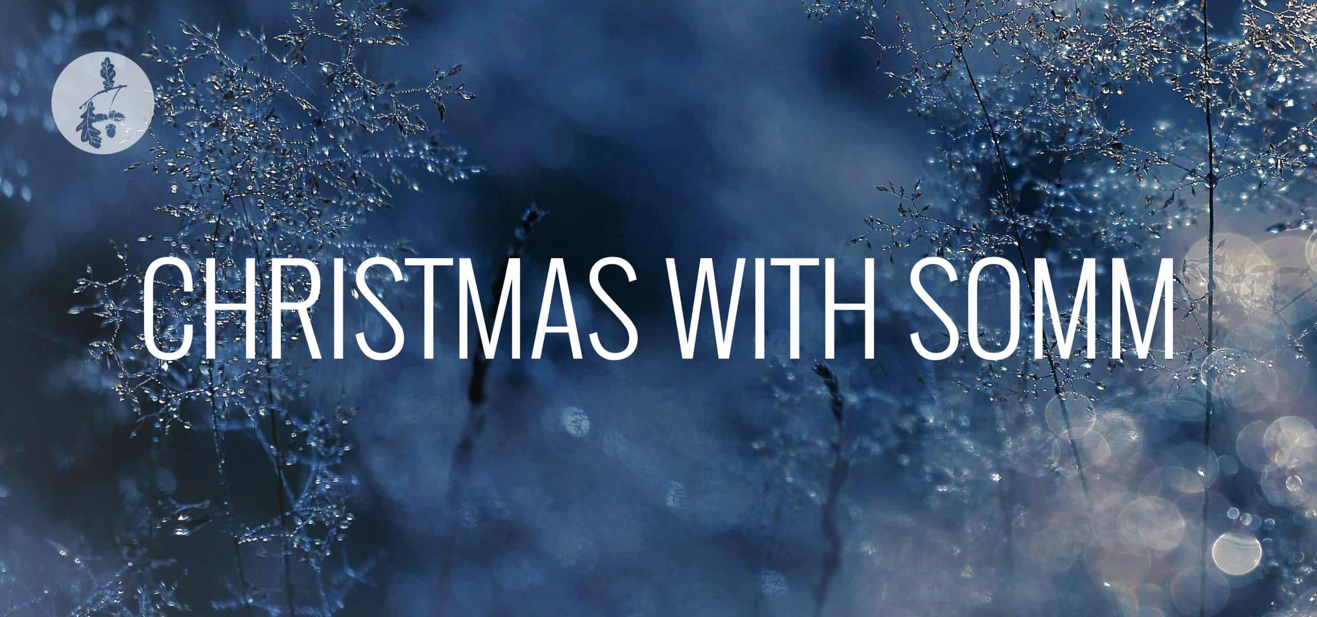 SOMM Christmas Spotify Playlist Image cover - soft snow background with title Christmas With SOMM